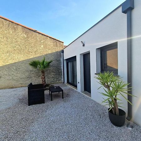 Plages Et Terres Apartment Bessan Bagian luar foto